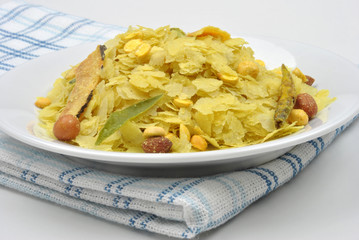 dry roasted chevda on a white plate