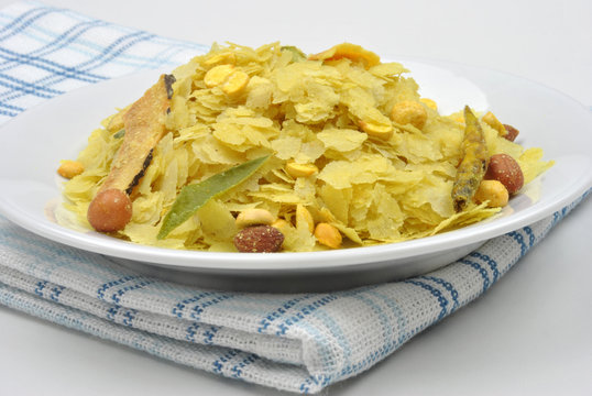 dry roasted chevda on a white plate