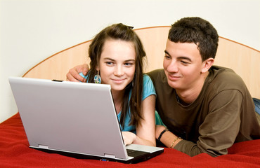 couple with laptop