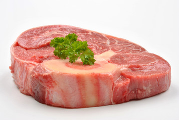 fresh organic beef shin steak and white background