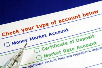 Fototapeta premium Select your bank account in the deposit slip isolated on blue