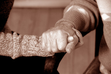 close up shot of hands holding each other