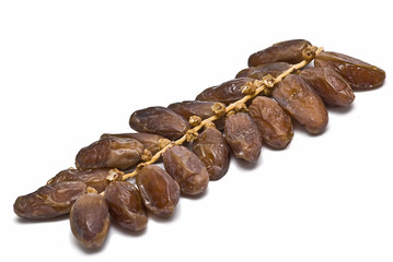 Rama de palmera con dátiles.