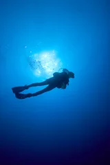 Foto op Plexiglas Duikers in de blauwe, tropische zee © Brandelet Didier