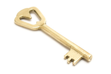 One golden and old key isolated on white background