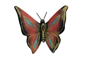 Detail of a ceramic ornamental butterfly isolated on white