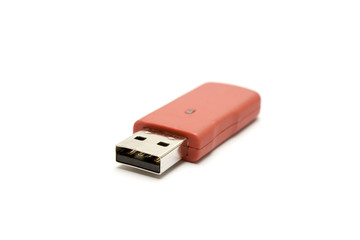 one red pen drive isolated in white background