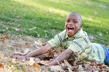 Cute Young African American Boy Having Fun in the Park