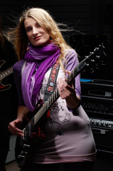 young female with rock guitar
