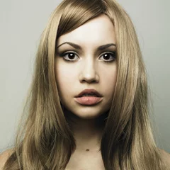 Foto op Plexiglas Beautiful young woman with blond hair © Egor Mayer