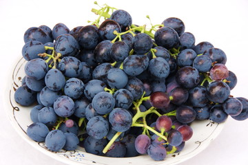 dark grapes on a white background