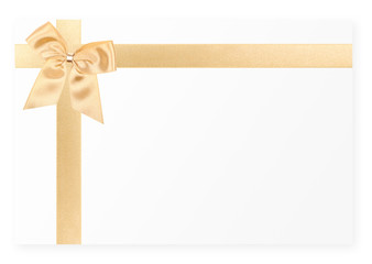 Gold gift bow on white card