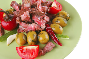 beef meat slices on green