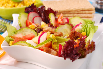 fresh salad with seafood and vegetables