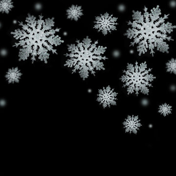Gentle silver snowflakes on a black background