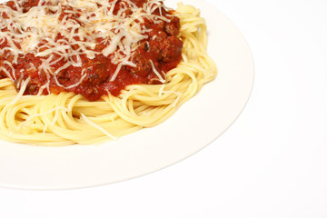 A plate of spaghetti with meat sauce.