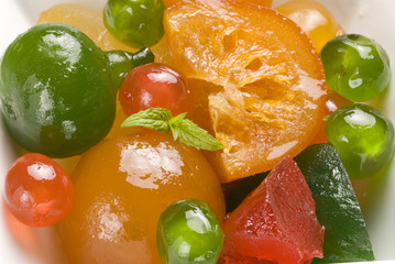 Candied fruits on a plate.