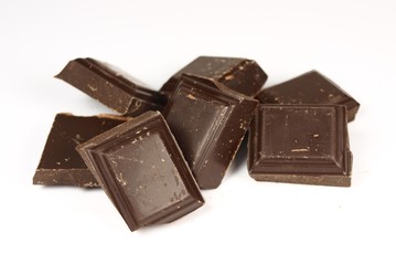 Bars of chocolate on white background