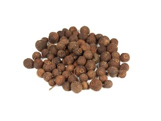 Allspice seeds on white background