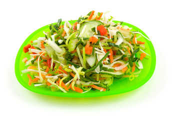 green fresh lettuce salad over white background
