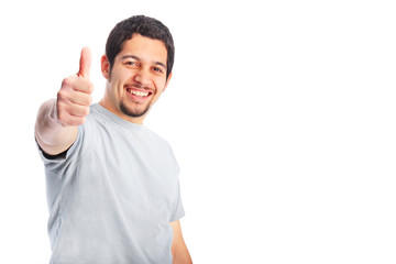Young adult giving thumbs up in casual clothing
