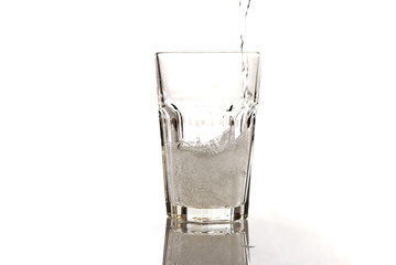 glass of mineral water isolated on white background