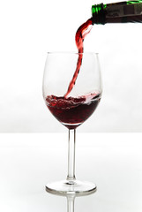 glass of red wine isolated on white background