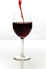 glass of red wine isolated on white background