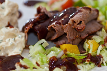 Roastbeef dinner with vegetables and sauce
