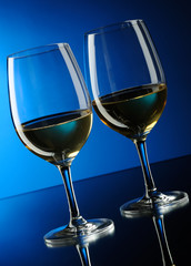 Two glasses of white wine.