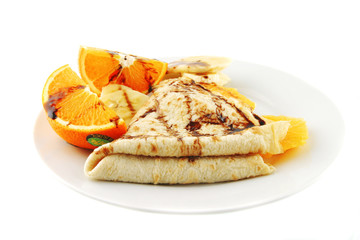 pancake with orange on dish