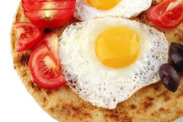 fried eggs with vegetables