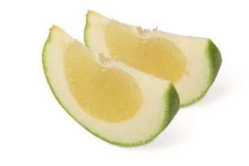 two slices of sweet green Pomelo (grapefruit)