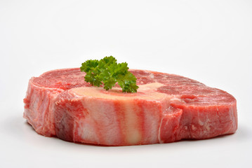 fresh organic beef shin steak and white background