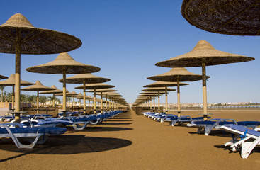 Beach on a sunny day. Hurghada city in Egypt.