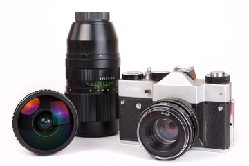 Retro SLR camera with set of lenses