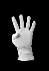 A white gloved hand isolated on black background
