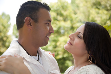 Fototapeta premium Attractive Hispanic Couple in the Park