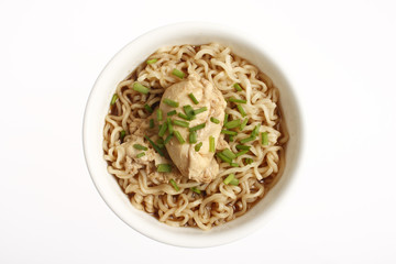 A bowl of Japanese ramen noodles isolated on white.