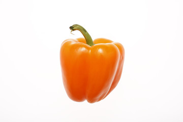 Orange pepper isolated on white.
