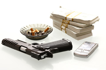 Cash,cellphone, and gun