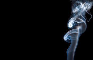 Bright smoke in a black background