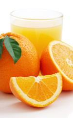 Orange with orange juice and the cut slices