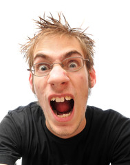 Screaming enraged young man isolated on white