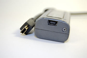 plugs of cable and MP3 player close-up