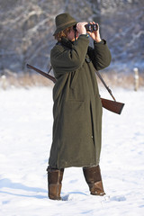 Waidmann mit Waffe und Glas