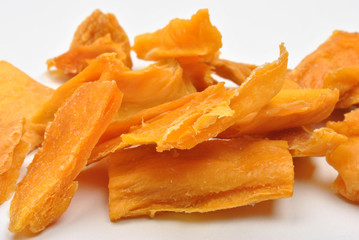 natural dried organic mango and a white background
