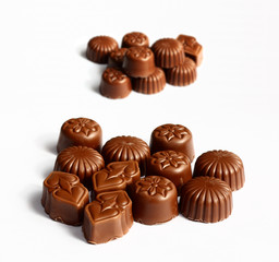 two groups of chocolate candies