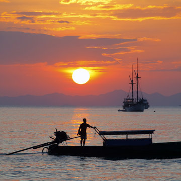 Longtail boats  at sunset, Thailand