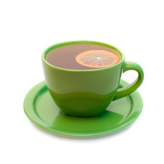 Lemon tea in green cup. Isolated on white background.